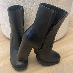 High heeled ankle boots with lugg sole